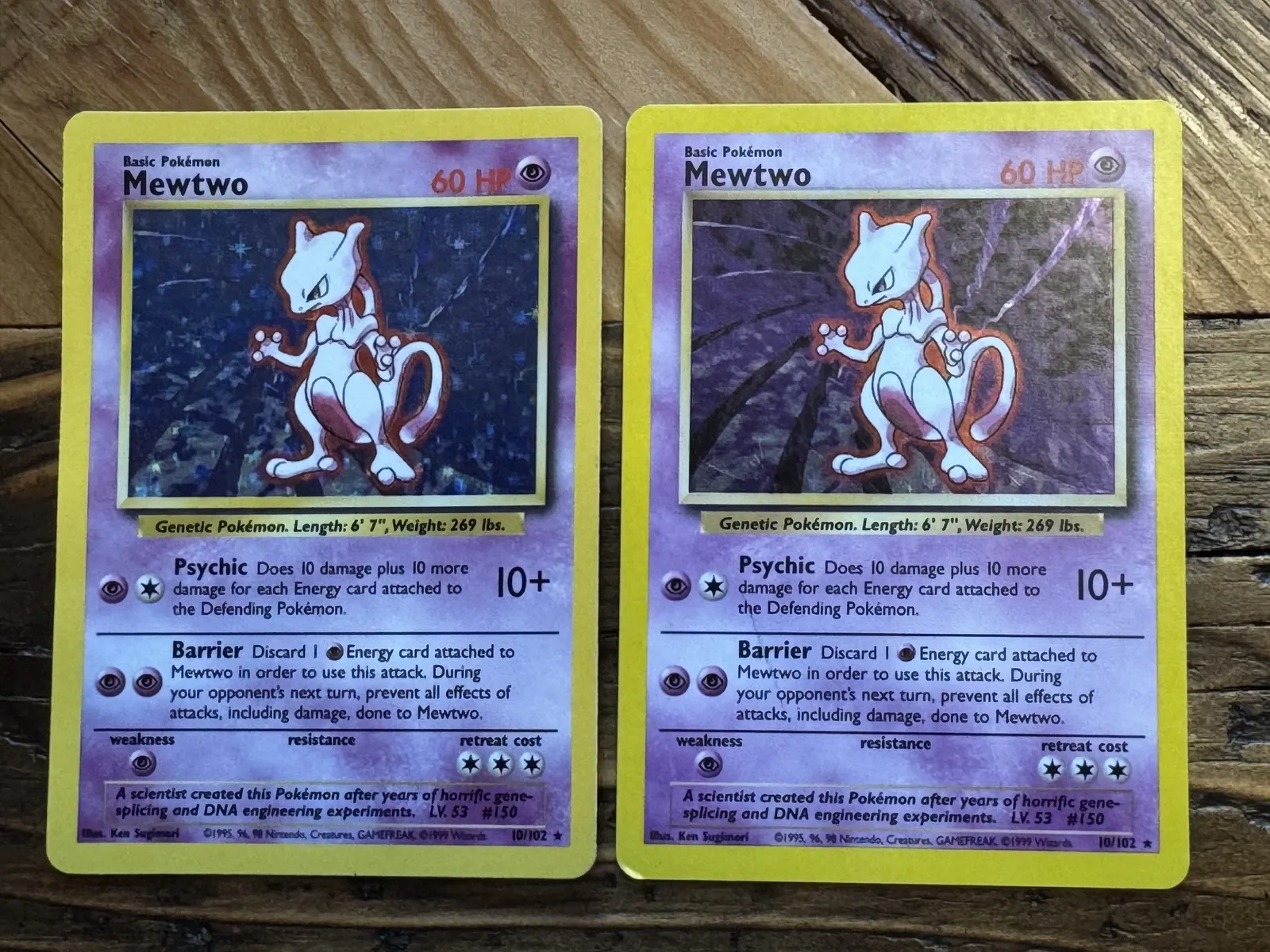 Two Base Set Mewtwo cards side by side. The left card has a cool blue-purple background with the background shapes washed out. The right card has a warm magenta cast, a brighter yellow border, visible angular structures behind Mewtwo, and an orange-red outline around the body